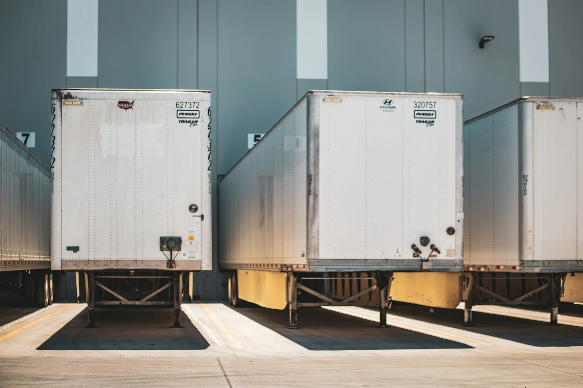 Trailers backed into a row of loading docks