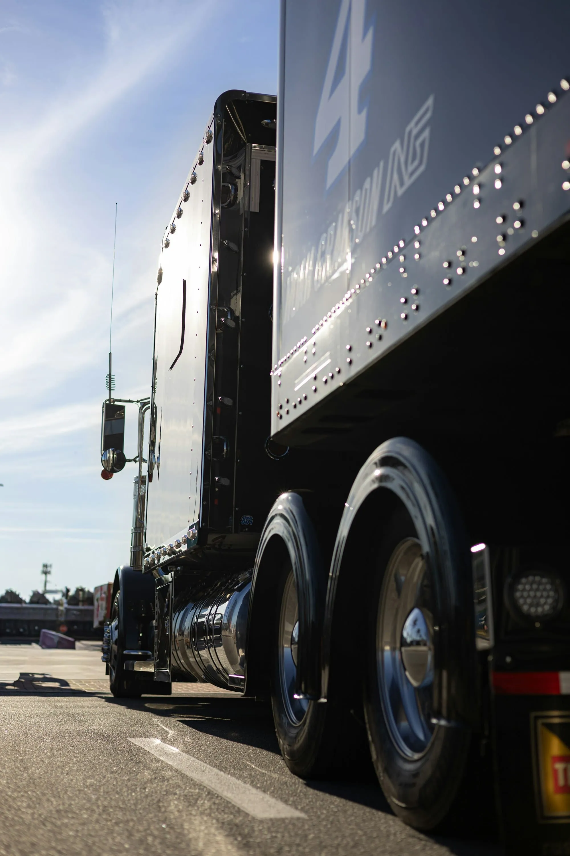 Close-up of a semi truck’s wheels and trailer